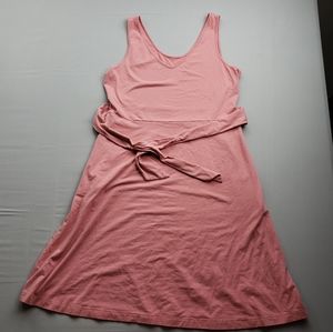 Blush pink dress size large with pockets and strap